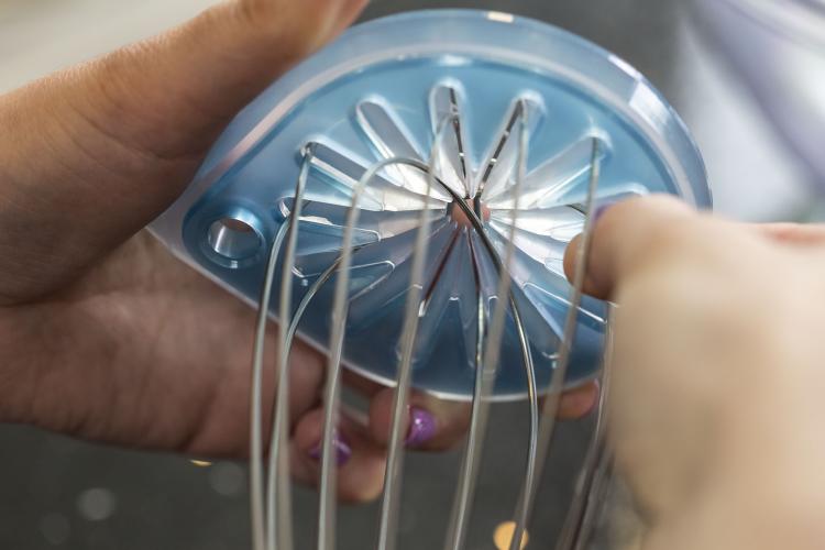 Whisk Wiper: Slides Up Whisk To Clean The Loops