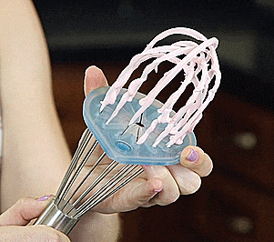 Whisk Wiper: Slides Up Whisk To Clean The Loops