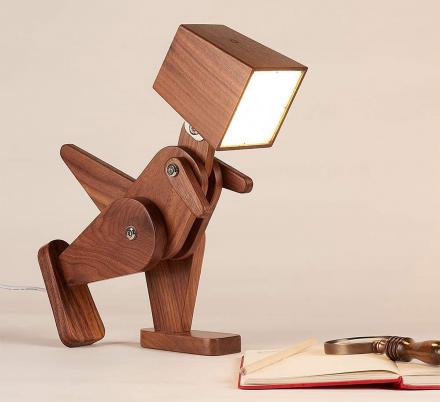 This Posable Wooden Dinosaur Lamp Is Perfect For A Dino Loving Kid's Room
