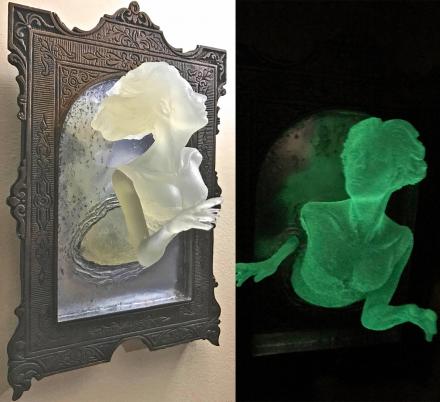 You Can Now Get a Super Creepy Ghost In The Mirror Wall Plaque That Glows In The Dark