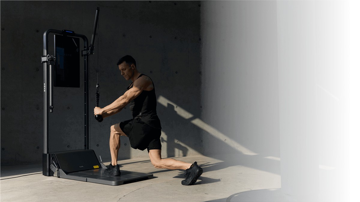 AEKE S1 Pro full-body AI home gym with cable handles in use