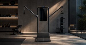 AEKE-style full-body AI home gym machine in a modern workout room