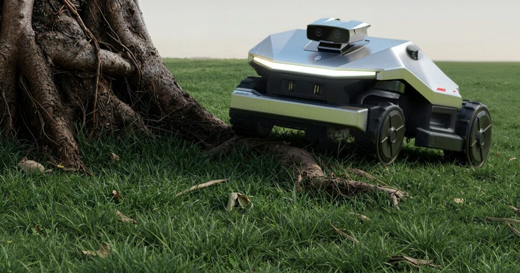 GOKO M6 robotic lawn mower near rough tree roots