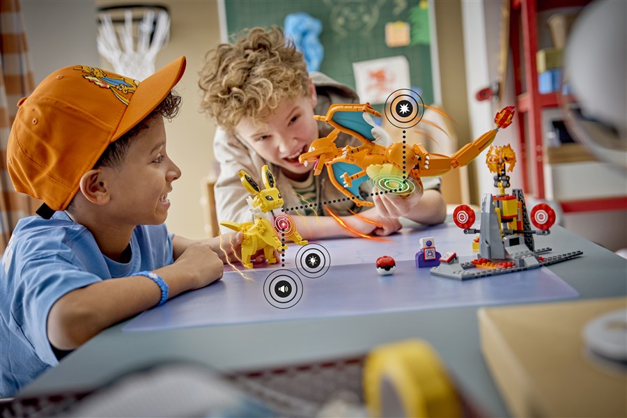 Children using LEGO Pokemon SMART Play pieces on a play table