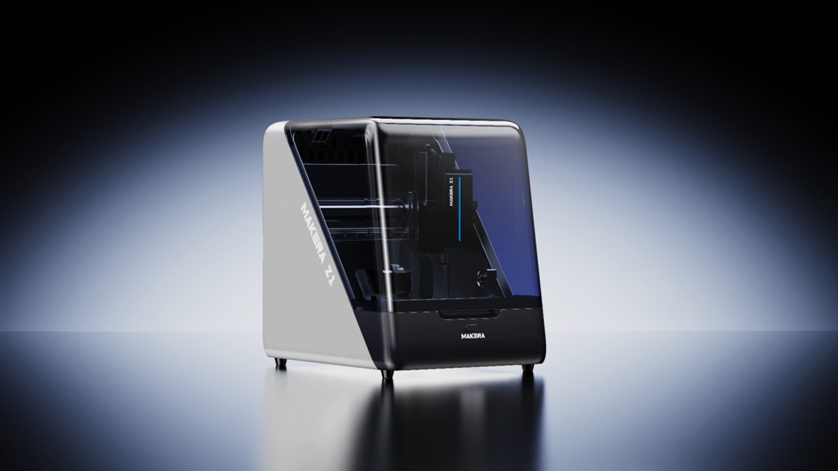 Makera Z1 enclosed desktop CNC machine on a studio background