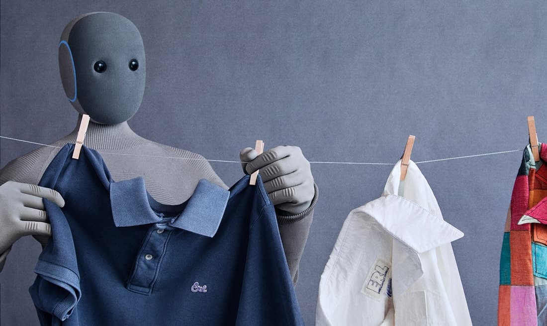 NEO humanoid robot hanging clothes on a line