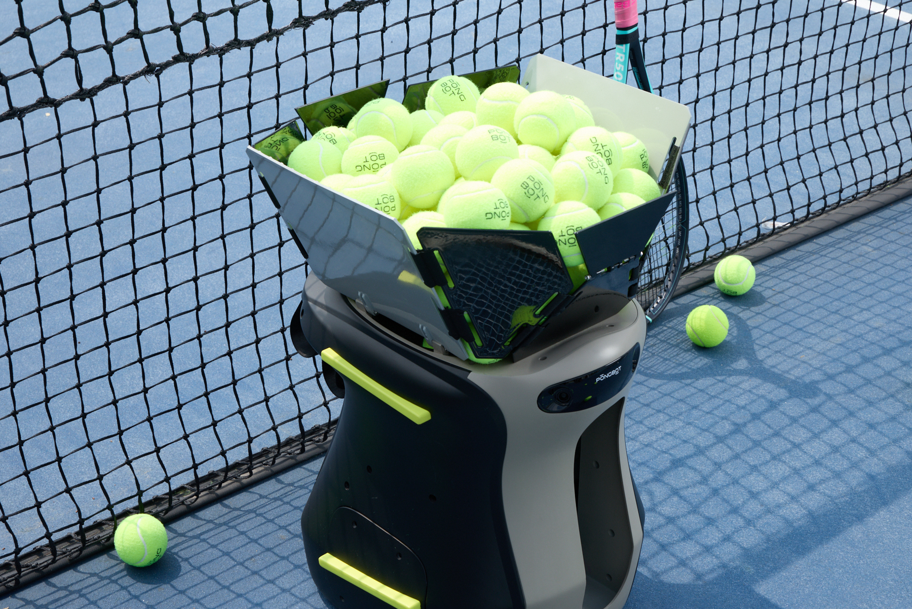PongBot Aura ball hopper filled with balls