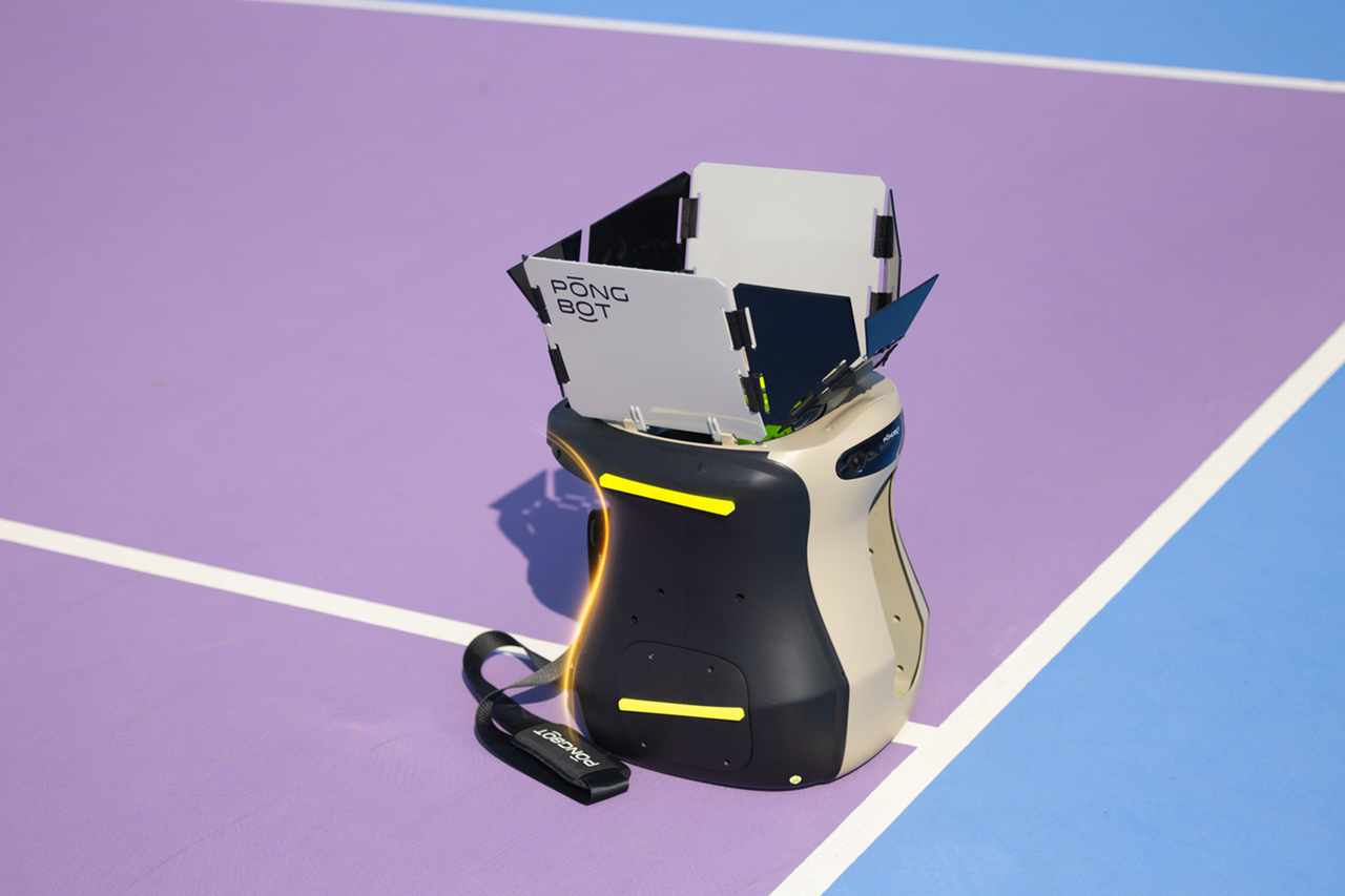 PongBot Aura robot ball machine on a court
