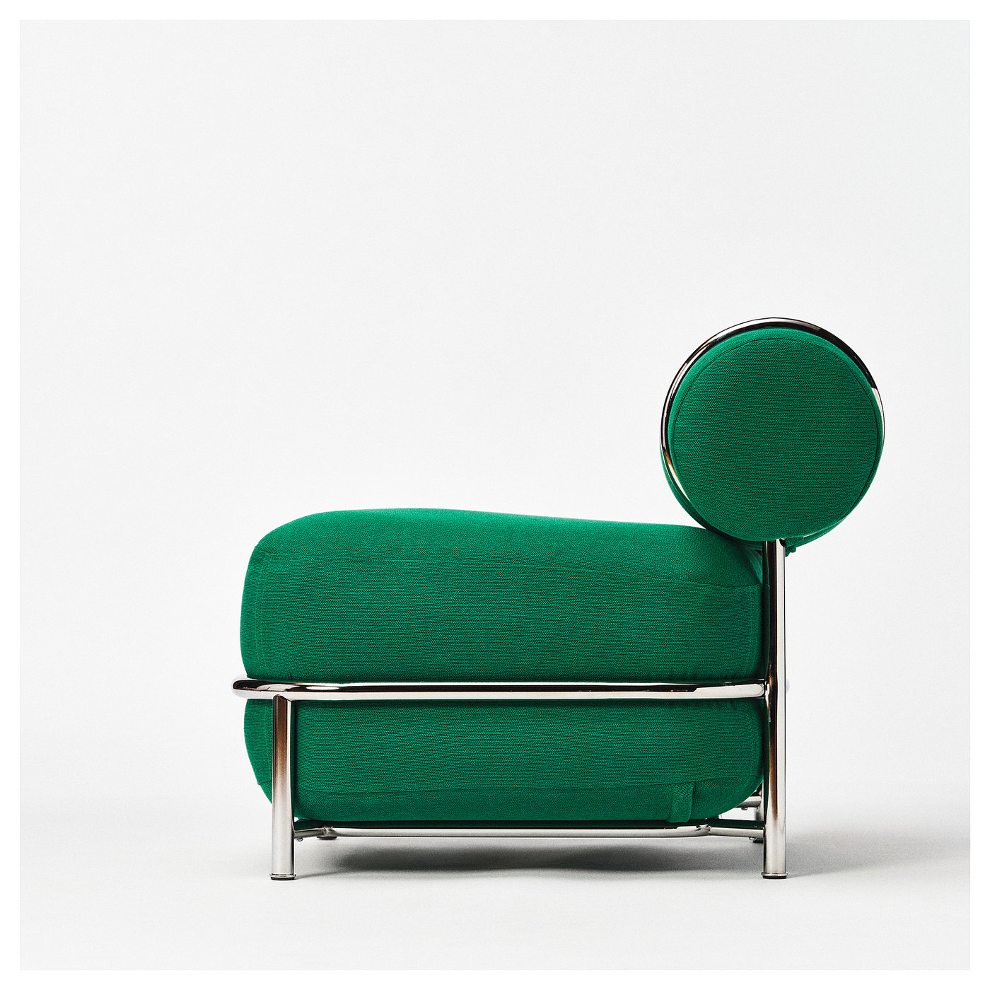 Side view of the green inflatable lounge chair and chrome frame