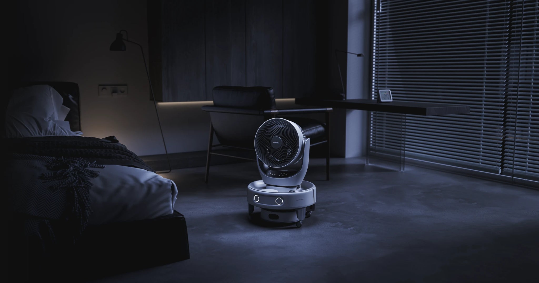 SwitchBot K20+ Pro carrying an air circulation fan through a room