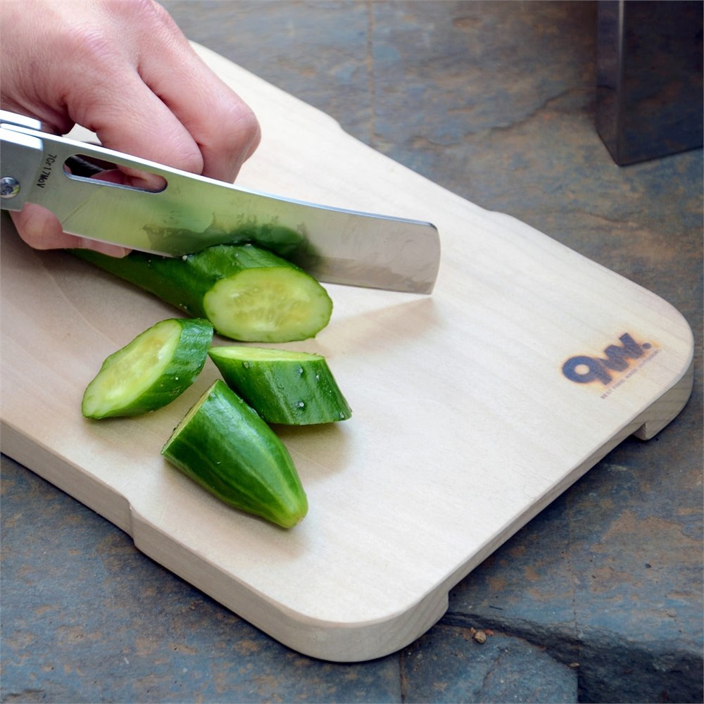 Compact modular grill plate cutting board used for sliced vegetables