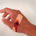 Bandages With Pictures of Severe Injuries On Them