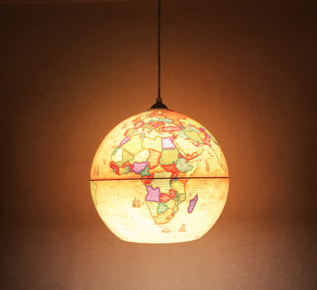 People Are Now Turning Their Old Globes Into Pendant Lights, and They Look Pretty Awesome
