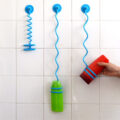 The Bungee Bath Is A Bungee Cord That Holds Your Shower Bottles