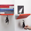 SuperShelf: A Book Shelf That Makes It Look Like Superman Is Holding Up Your Books