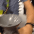 Travel Dog Water Bottle Has Bowl On Top That You Squeeze Water In To