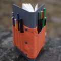 Penroll: A Designers Tool Belt That Wraps Around Your Notebook