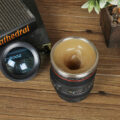 This Camera Lens Coffee Mug Stirs Itself