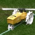 Raintrain Traveling Sprinkler Crawls Across Your Lawn While Watering Your Grass