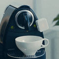 Switch Bot: A Tiny Robot That Flips Any Switch For You Remotely