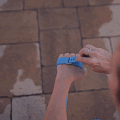 Aquapaw is a Palm-Sized Dog Scrubber/Sprayer That Attaches To Your Hose
