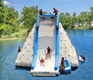 Giant Lake Inflatable Rock Climbing Wall and Slide