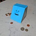 Face Bank: A Creepy Chewing Coin Bank That Eats Your Coins