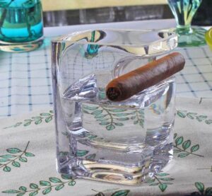 There's a Whiskey Glass That Has an Integrated Cigar Holder On The Side Of It