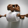 This T-Rex Skeleton Toilet Paper Holder Is Perfect For Dino Lovers
