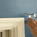 These Genius Tap-In Curtain Rod Holders Install In Just Seconds
