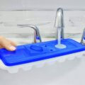 There Are Ice Trays With Lids To Prevent Spilling On The Walk To The Freezer