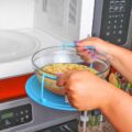 This Genius Bowl Holder Lets You Safely Remove Scalding Hot Bowls From The Microwave
