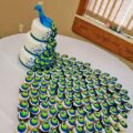 This Incredible Peacock Wedding Cake Uses Cupcakes For The Tail