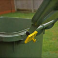 This Genius Garbage Can Lid Assist Stops The Trash Lid From Slamming Backwards
