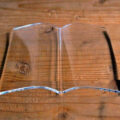 This Ingenious Glass Book Page Holder Keeps Your Book Open For Hands-Free Reading