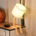This Sad Man Adjustable Wooden Lamp Is How We All Currently Feel