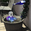 These Plans Let You Build Your Own Backyard Wine Bottle Fountain