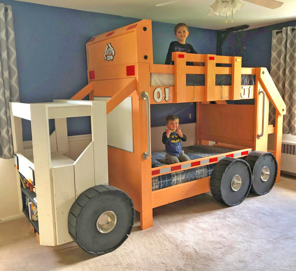This Garbage Truck Bunk Bed Has a Desk and Bookshelf In The Cabin Of The Truck