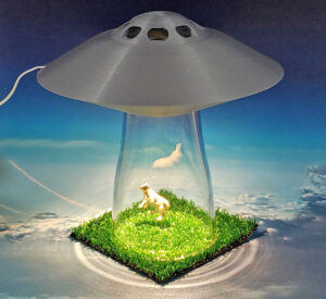 This UFO Lamp Makes It Look Like Aliens are Abducting a Cow, People, Dog, etc.