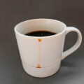 This Genius Drip-Catching Coffee Mug Will Keep Your Table Clear Of Drip Stains
