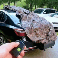 This Nifty Car Cover Automatically Retracts Itself, and Hides In Your Trunk