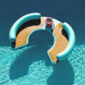 This Giant Curved Inflatable Dock Holds Up To 6 Adults and a Cooler