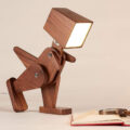 This Posable Wooden Dinosaur Lamp Is Perfect For A Dino Loving Kid's Room