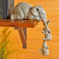 This Elephant With Hanging Baby Elephants Bookend Statue Is Just Too Adorable