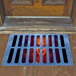 This Creepy Pennywise Clown In Sewer Doormat Is The Perfect Halloween Decor Piece