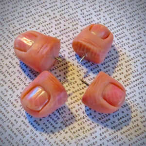 These Realistic Human Thumb Tacks Are The Perfect Creepy Office Accessory