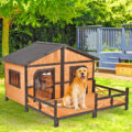 This Outdoor Double Doghouse Has a Deck Where Both Your Pooches Can Lounge All Summer