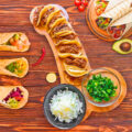 This Funny Penis Shaped Charcuterie Board Lets You Serve Snacks with a Side of Humor