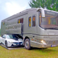 This $1.7 Million Luxury Motorhome has Its Own Side-Load Garage To Hold a Car