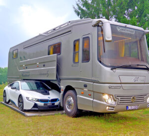 This $1.7 Million Luxury Motorhome has Its Own Side-Load Garage To Hold a Car